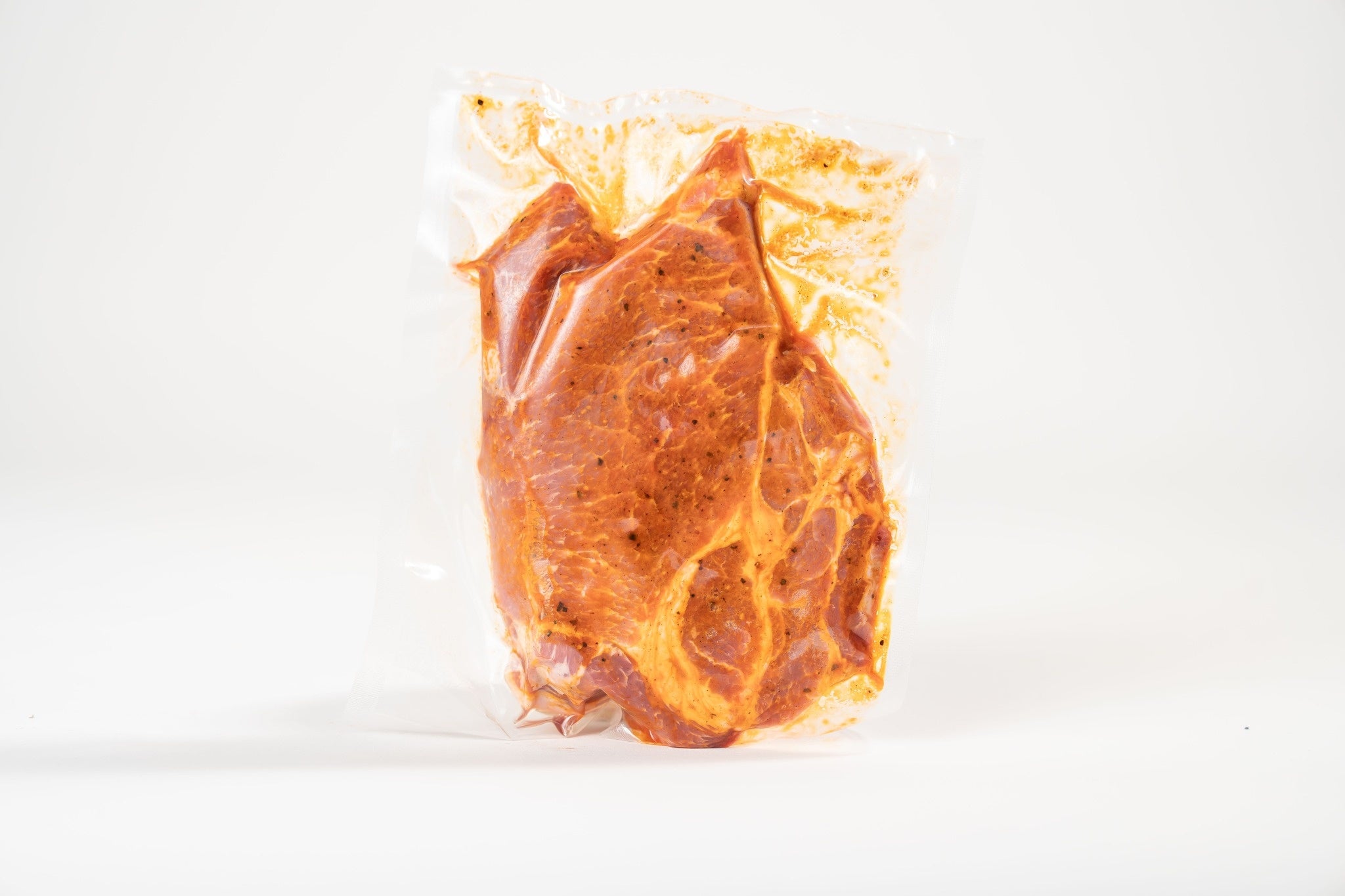 Schwein-Schopfsteak ohne Knochen gewürzt