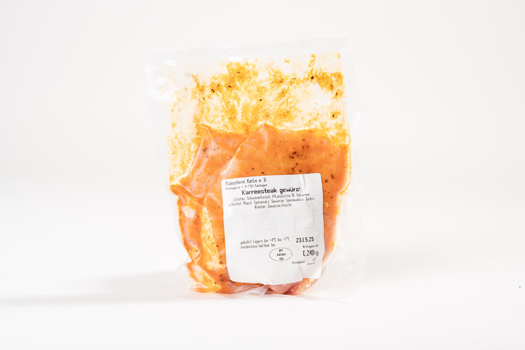Schwein-Karreesteak gewürzt