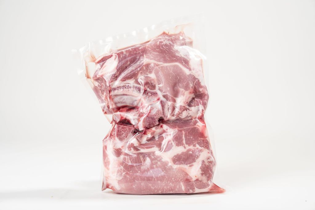 Schwein-Schopfkotelette mit Knochen